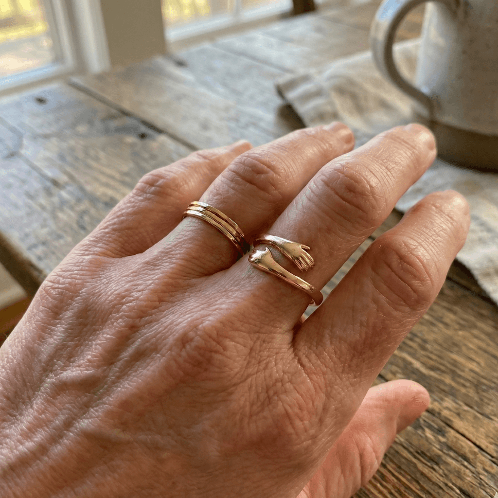 rose gold adjustable hug ring on finger