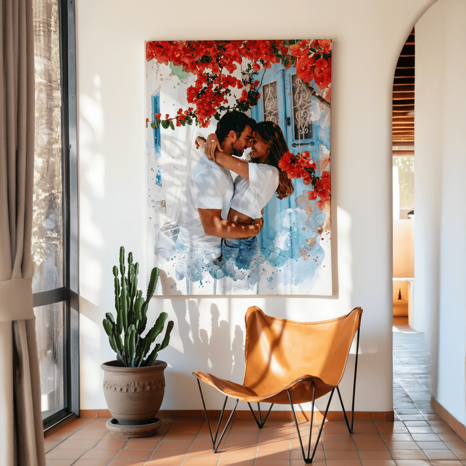 Woman smiling, holding a framed personalized watercolor print of a couple kissing under pink bougainvillea 