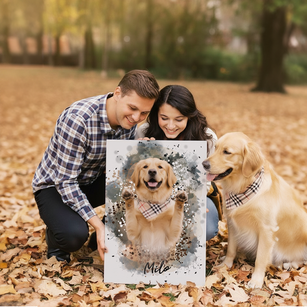 couple siting outside in autumn time with a custom canvas of their dog