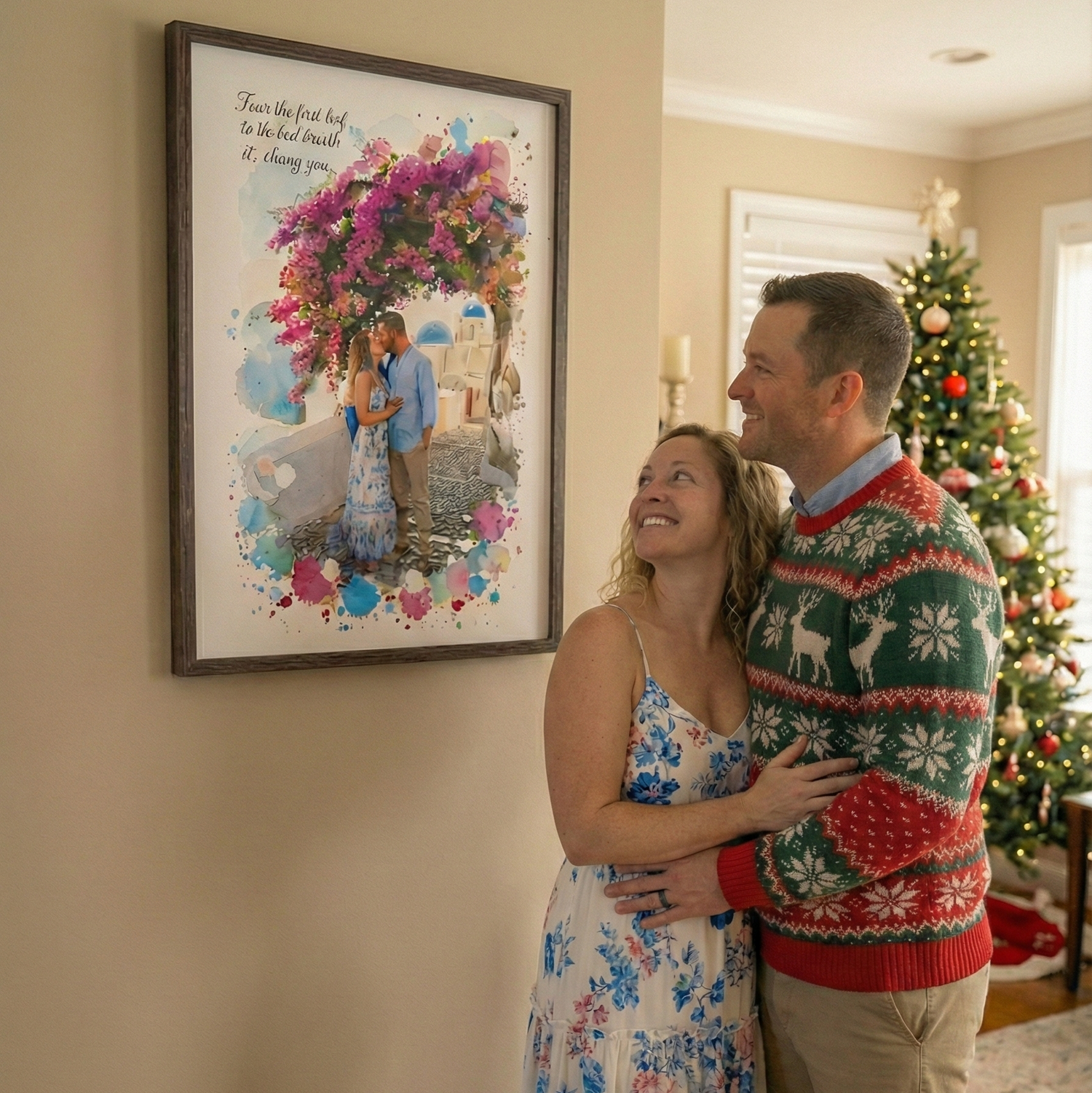 Couple standing by a framed personalized watercolor print of a couple kissing under bougainvillea, with a Christmas tree in the background.
