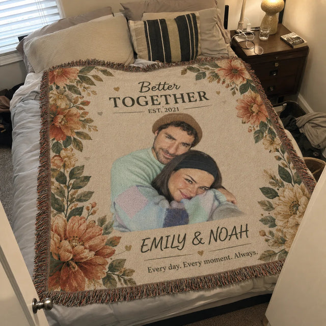 Customer photo — Better Together floral woven blanket spread on a bed with names and est. year