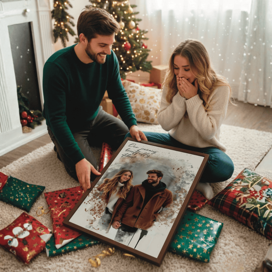 Couple sitting on the floor unwrapping Christmas gifts with a framed personalized couples canvas in the center 
