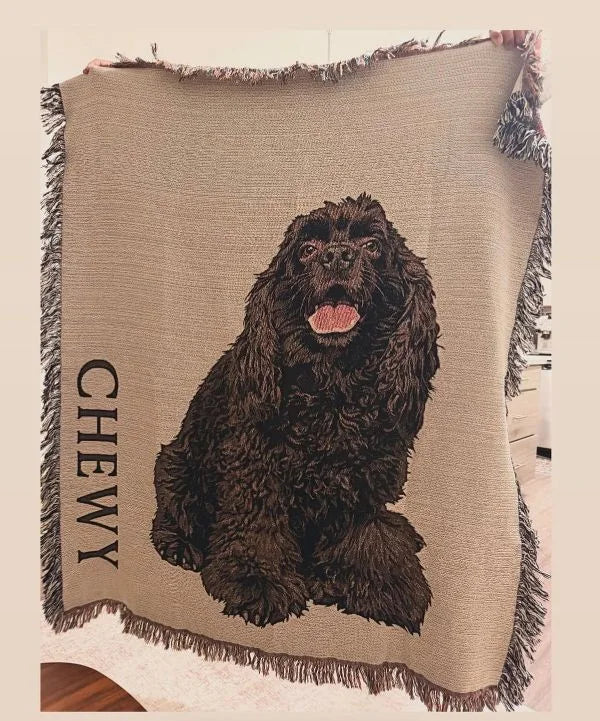Customer photo of a personalized dog woven blanket featuring a black cocker spaniel named Chewy