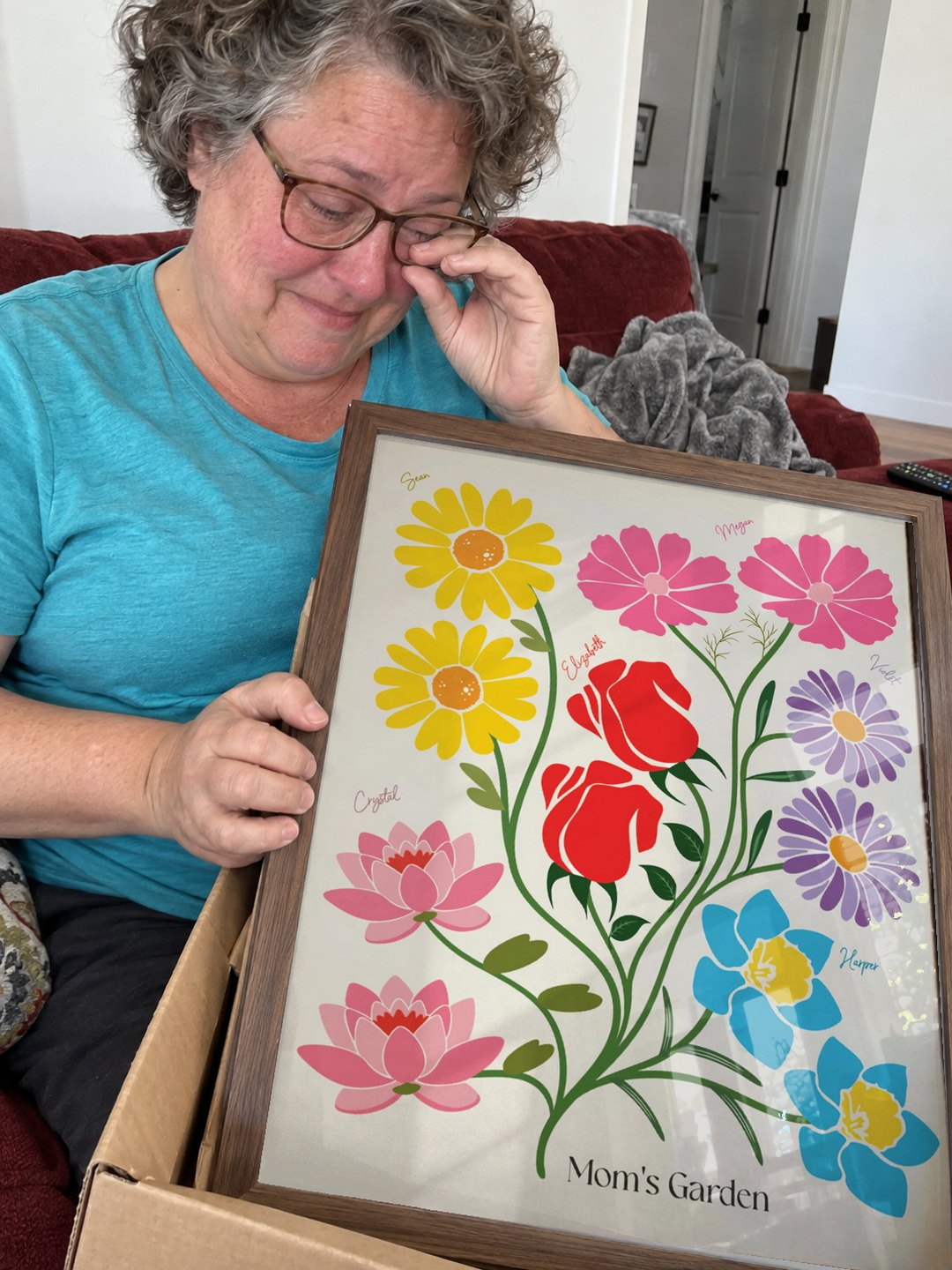 Mom wiping a happy tear as she opens her garden