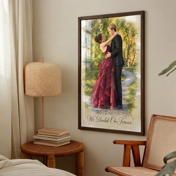 A framed watercolor portrait of a couple in a garden, she in a red gown, hangs beside a lamp.