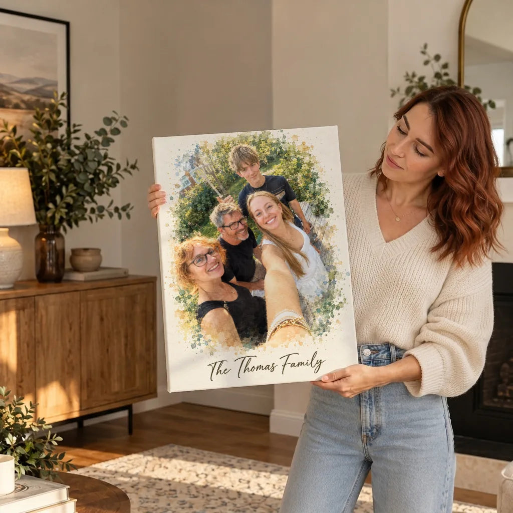 A smiling woman holding a canvas watercolor portrait of four family members in her living room
