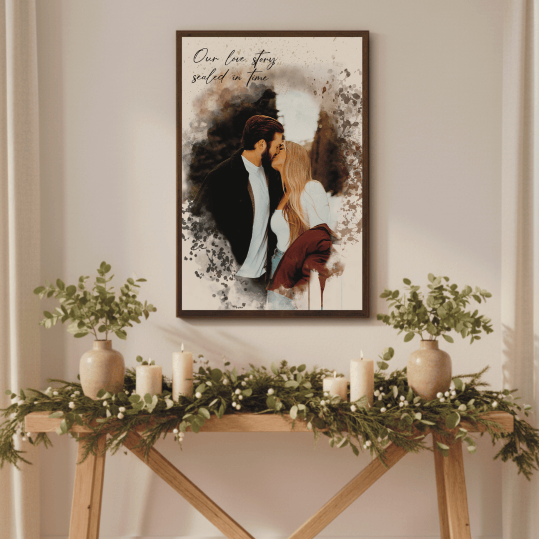 framed personalized couples portrait hanging above a table with greenery and candles on  